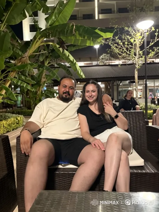 Family Embraces Toddler in Outdoor Patio Scene – AI Generated Video | Hailuo AI