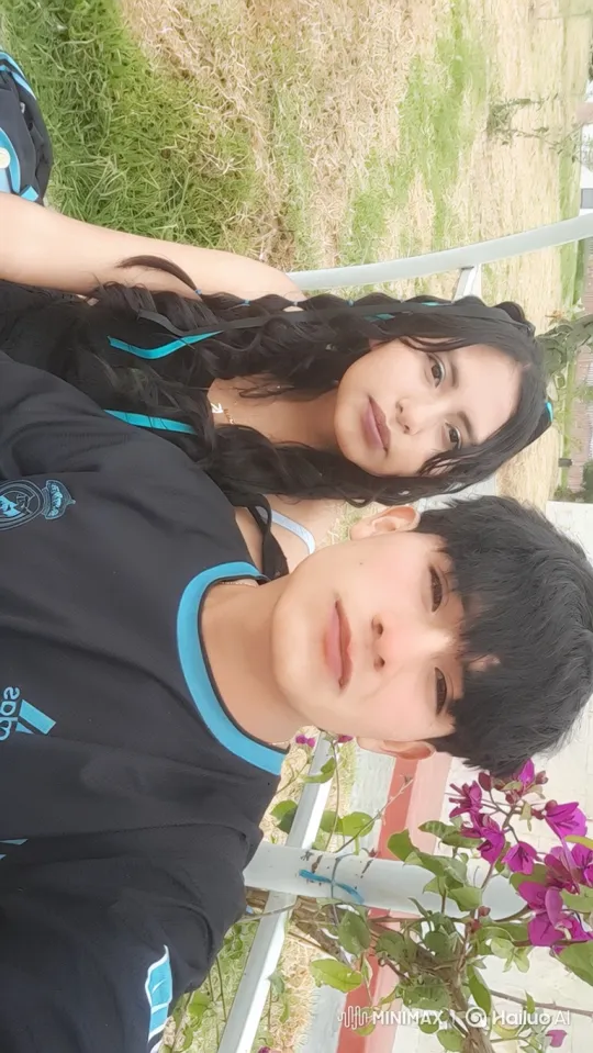 Young Family Embraces in Sunlit Park – AI Generated Video | Hailuo AI