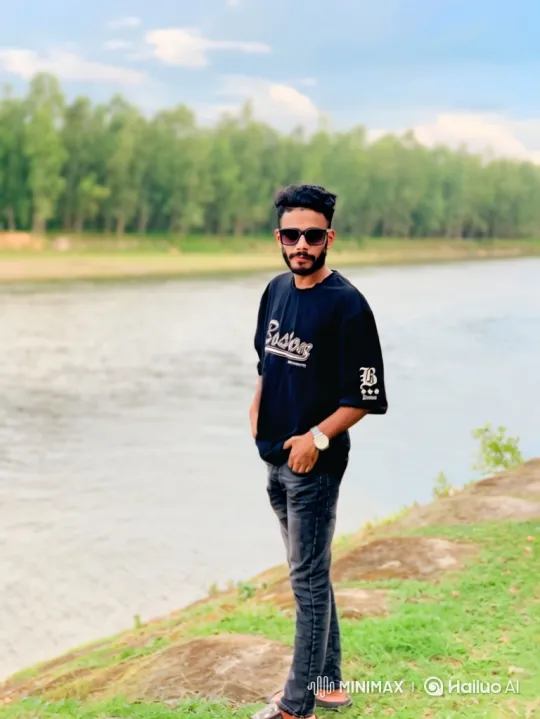 Couple Sharing a Serene Moment by a River – AI Generated Video | Hailuo AI