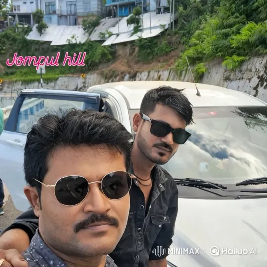 Two Men's Hillside Selfie Morphs into Urban Panorama – AI Generated Video | Hailuo AI
