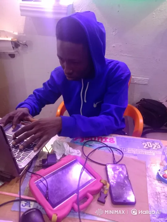 Focused Young Man Working Intently at Night – AI Generated Video | Hailuo AI
