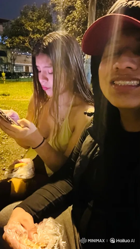 Young Women and Child Embrace in Park at Night – AI Generated Video | Hailuo AI