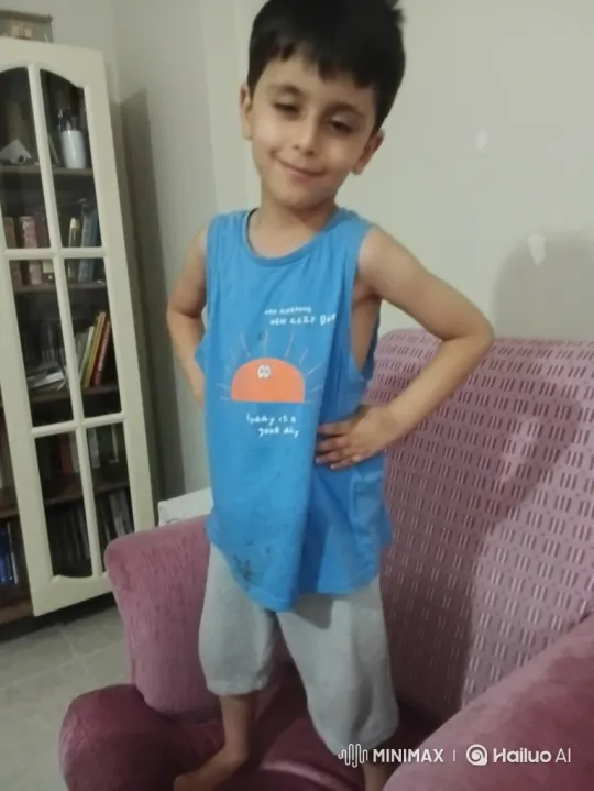 Boy Transforms into Baby on Pink Sofa – AI Generated Video | Hailuo AI