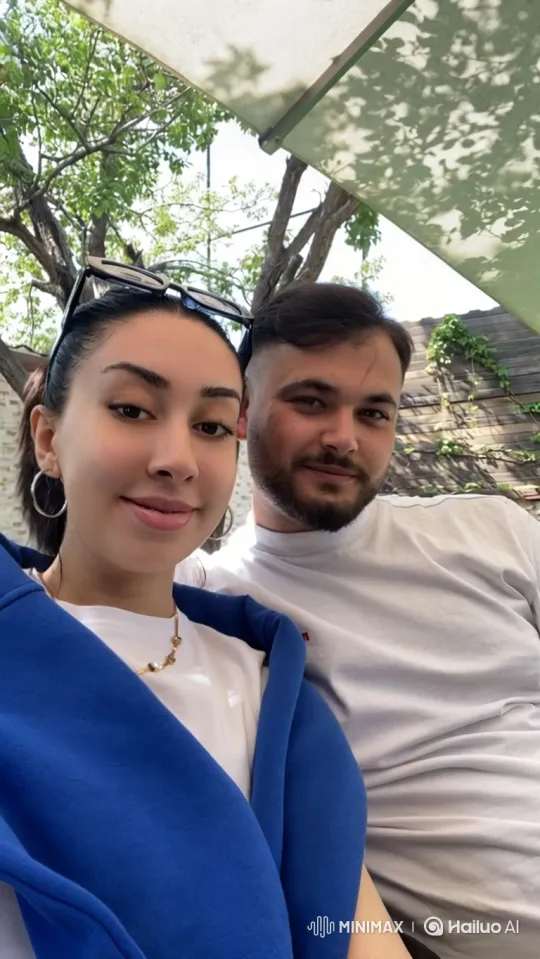 Family Embrace: Young Parents and Child Share a Loving Moment – AI Generated Video | Hailuo AI