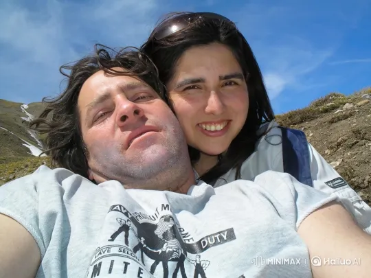 Family Embraces Peaceful Moment on Mountainside – AI Generated Video | Hailuo AI