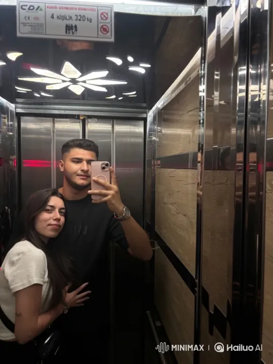 Young Couple's Playful Dance and Mock-Fight in Elevator – AI Generated Video | Hailuo AI