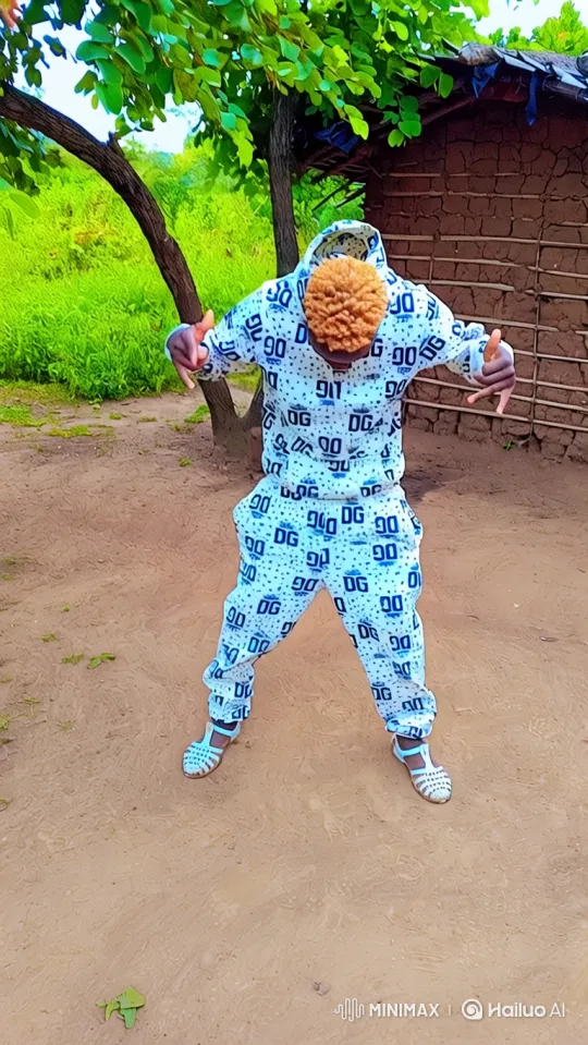Dancer in White Hooded Suit with Dynamic Pose – AI Generated Video | Hailuo AI