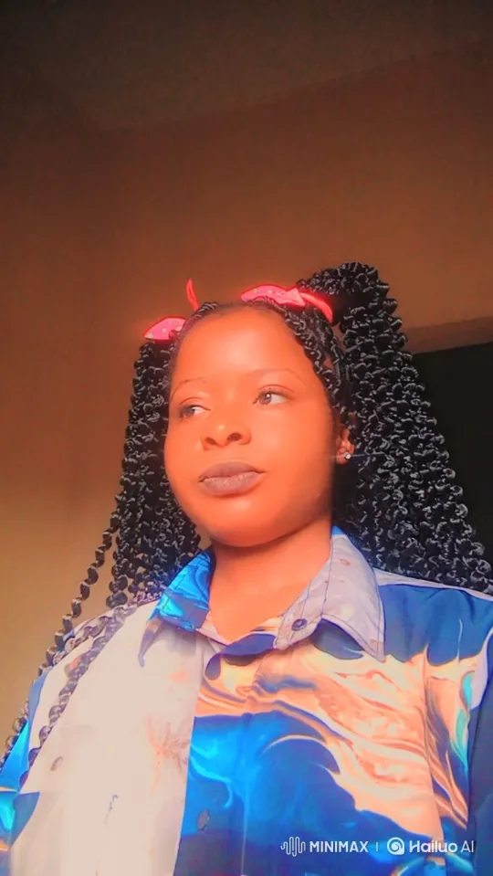 Young Woman in Contemplative Pose with Braided Pigtails – AI Generated Video | Hailuo AI