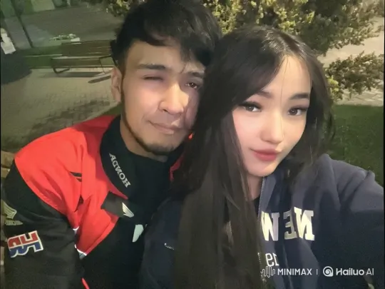 Family Embrace Captured on Park Bench at Night – AI Generated Video | Hailuo AI