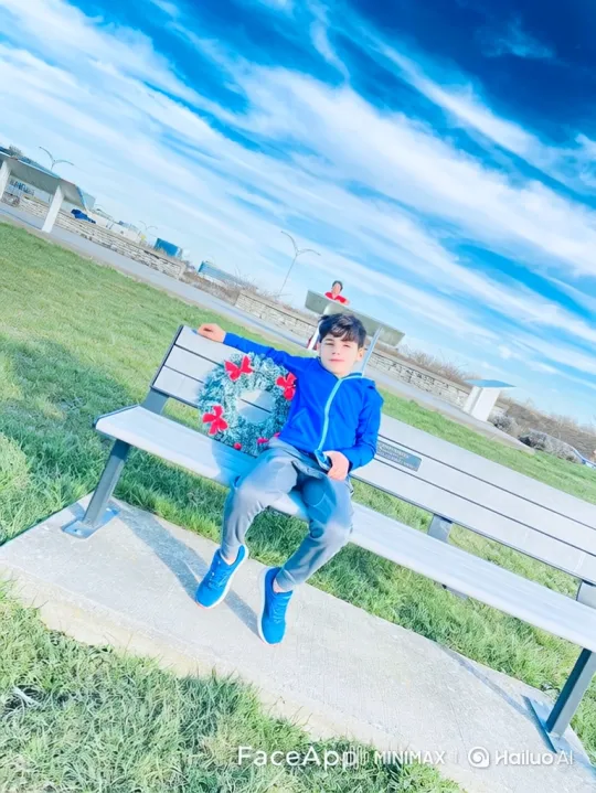 Boy Hops with Joy in Sunny Park Setting – AI Generated Video | Hailuo AI
