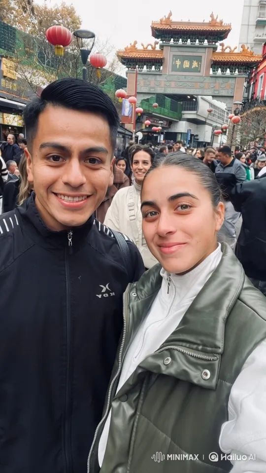 Couple's Joyful Moment in Bustling East Asian Street – AI Generated Video | Hailuo AI