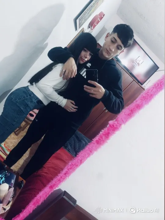 Young Couple Takes Selfie With Child's Hug – AI Generated Video | Hailuo AI