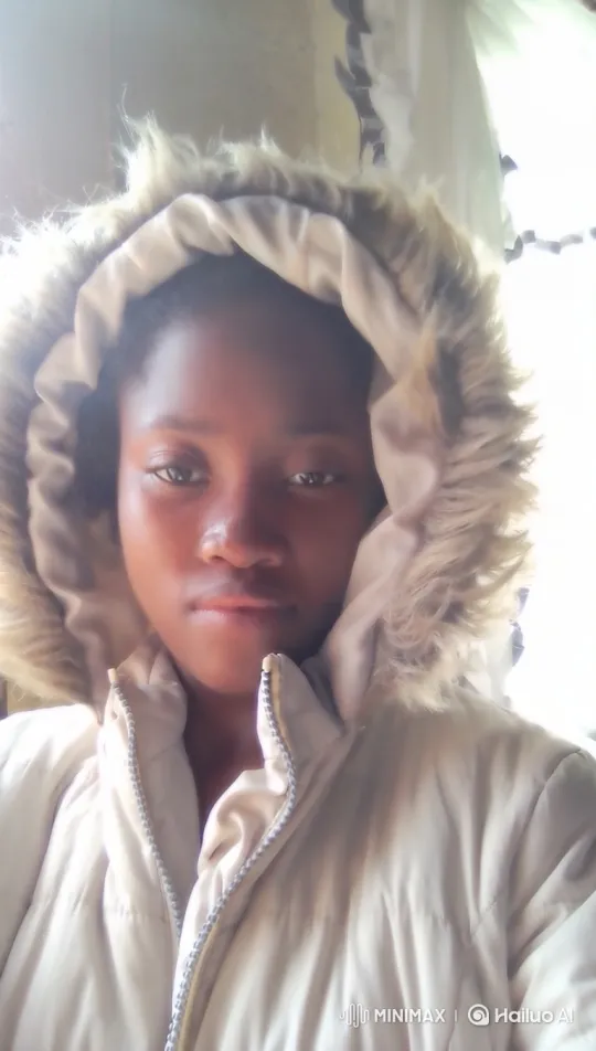 Young Person in Puffer Jacket: Steady Tracking Shot – AI Generated Video | Hailuo AI