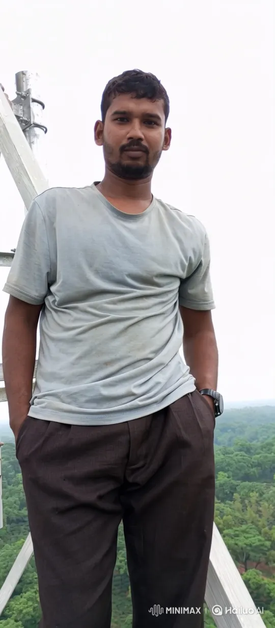 Man Reflects on Forest View with Gentle Smile – AI Generated Video | Hailuo AI