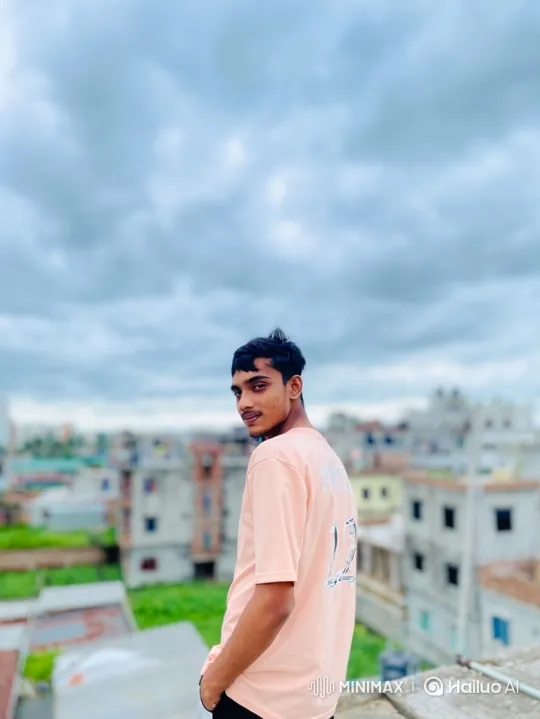 Young Man Reflects on Rooftop Cityscape – AI Generated Video | Hailuo AI