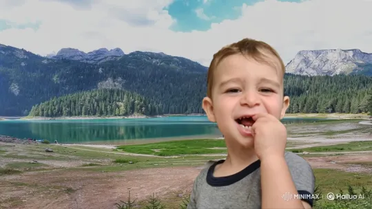 Boy Laughs Joyfully Against Mountainous Lake Background – AI Generated Video | Hailuo AI