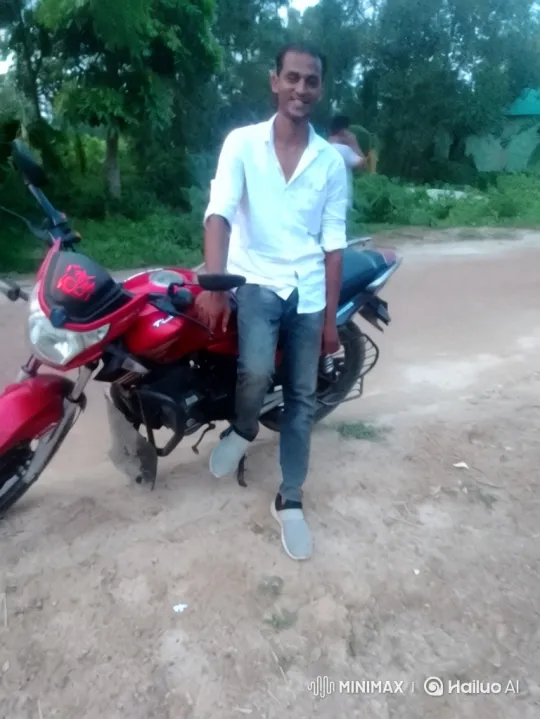 Young Man Smiles by Motorcycle in Serene Nature – AI Generated Video | Hailuo AI