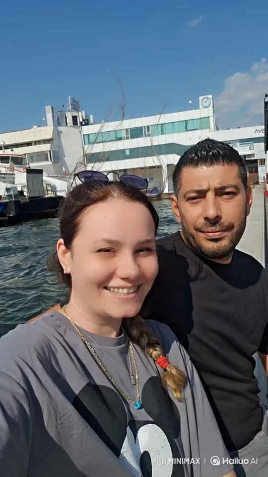 Family Embraces by Sunlit Waterfront – AI Generated Video | Hailuo AI