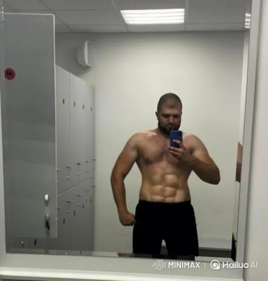 Muscular Man Takes Selfie in Locker Room – AI Generated Video | Hailuo AI