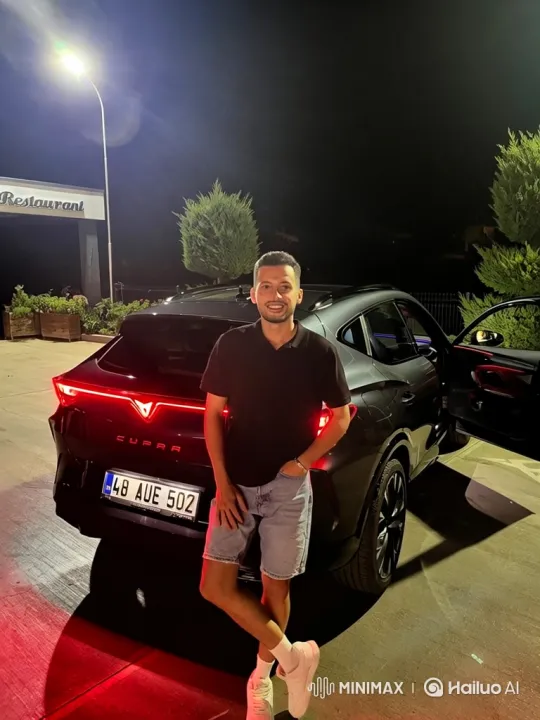 Man and Car in Nighttime Parking Lot Setting – AI Generated Video | Hailuo AI