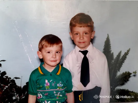 Vintage Photo Comes Alive: A Tender Brotherly Embrace – AI Generated Video | Hailuo AI