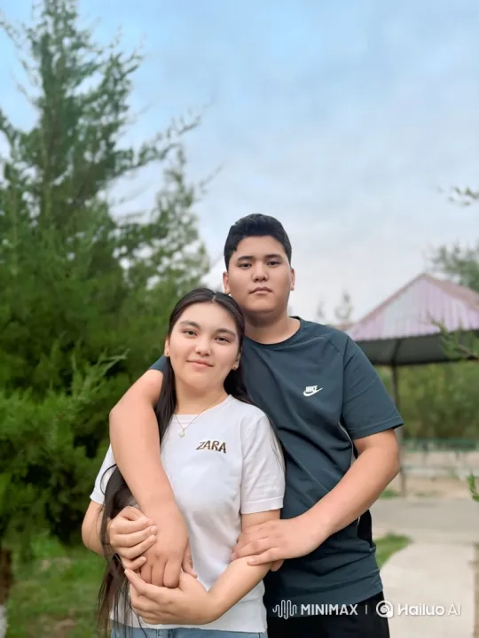 Family Embraces in Evening Park Setting – AI Generated Video | Hailuo AI