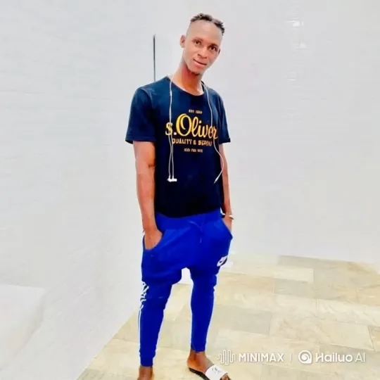 Young Man in Modern Room with Casual Pose – AI Generated Video | Hailuo AI