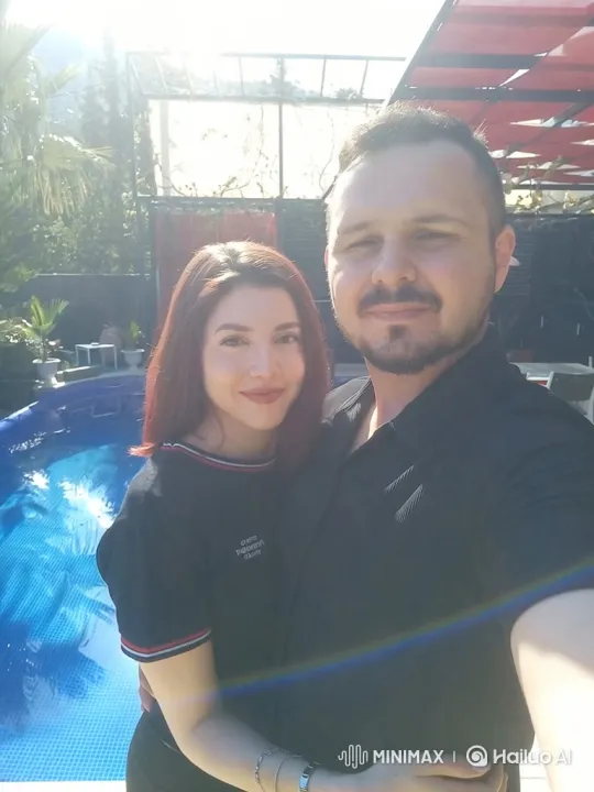 Young Family Embraces Love in Backyard Video – AI Generated Video | Hailuo AI