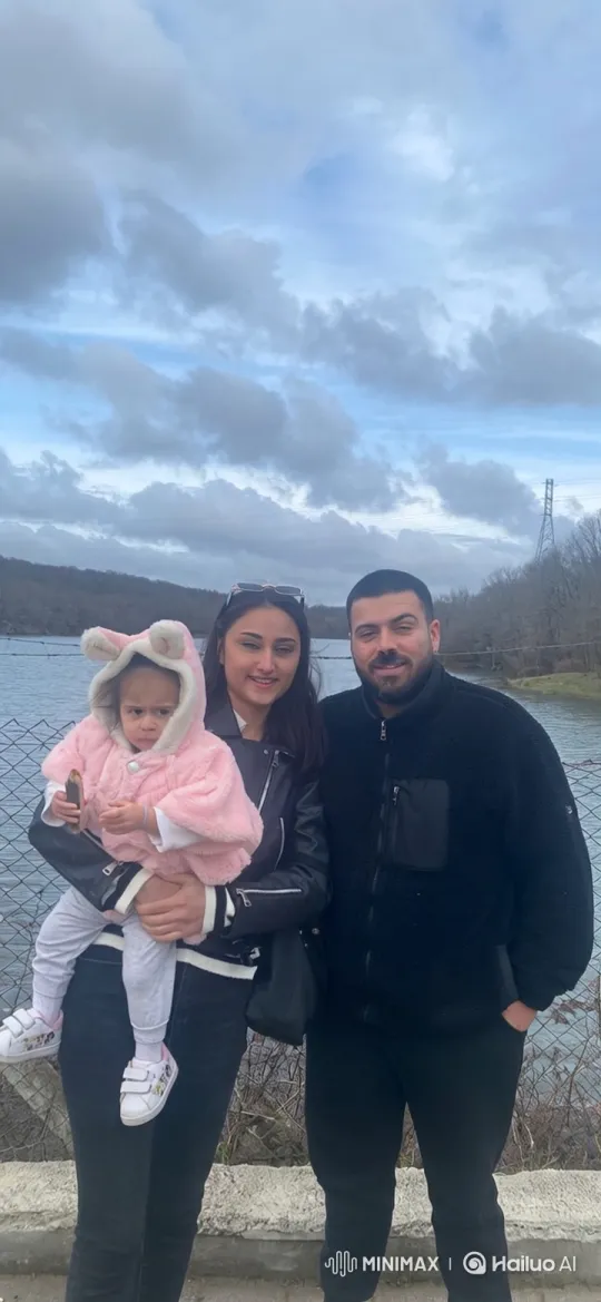 Family Embraces by Water in Joyful Hug – AI Generated Video | Hailuo AI