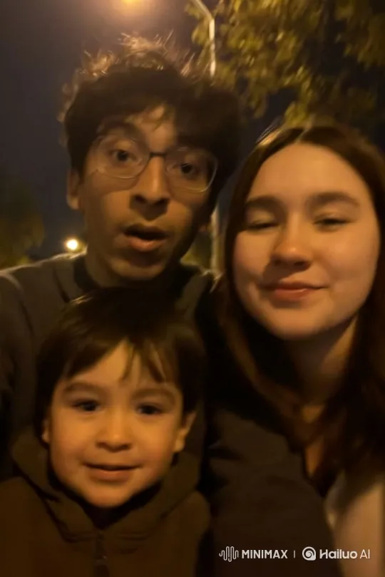 Family Embraces Under Park Lamp at Night – AI Generated Video | Hailuo AI