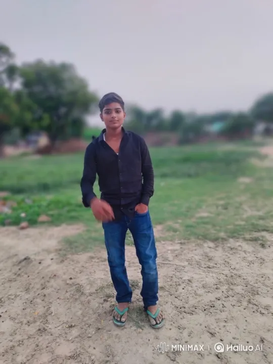 Young Man in Field: A Study in Subtle Movements – AI Generated Video | Hailuo AI