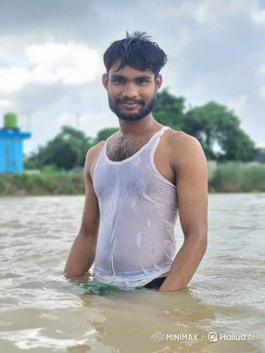 Young Man in Murky Water with Gentle Smile – AI Generated Video | Hailuo AI