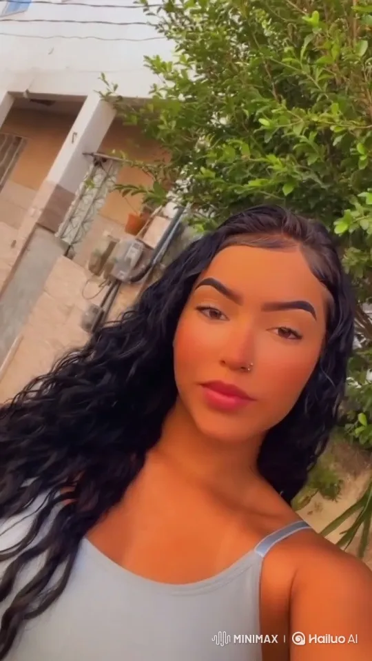 Young Woman Gazing Calmly at Camera – AI Generated Video | Hailuo AI
