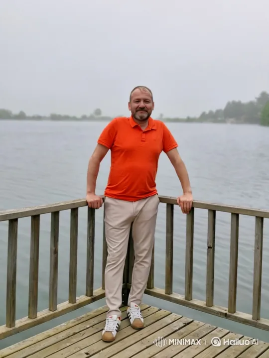 Contemplative Man Observes Foggy Lake from Pier – AI Generated Video | Hailuo AI