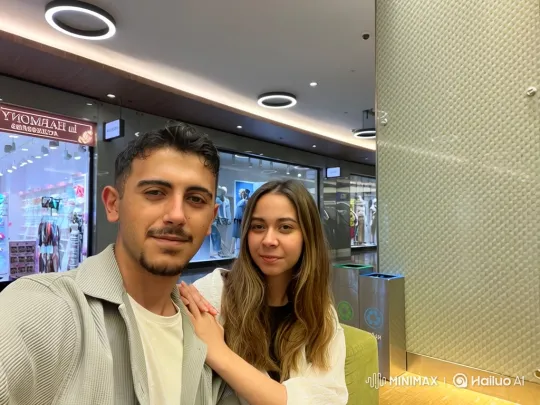 Couple and Daughter Embrace in Summer Evening's Glow – AI Generated Video | Hailuo AI