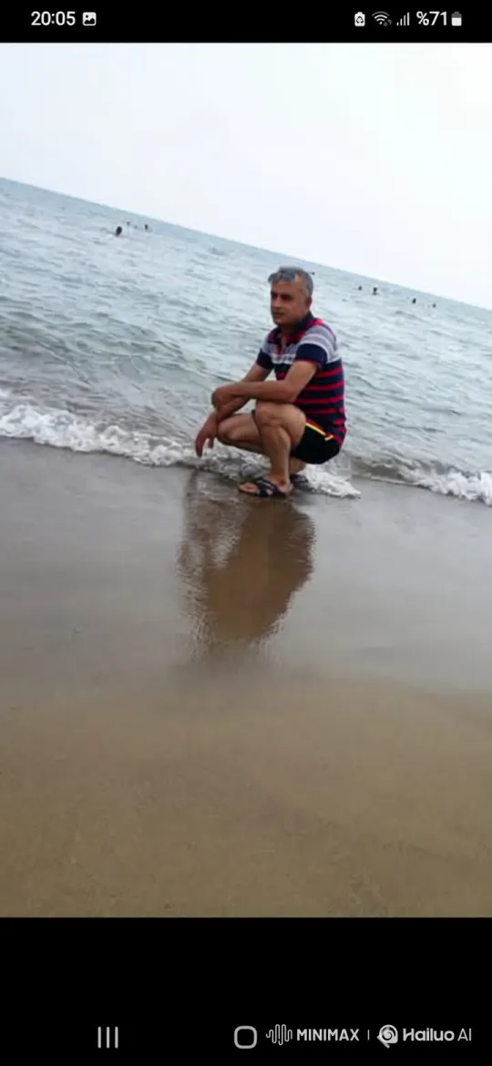 Contemplative Man Reflecting at the Seaside – AI Generated Video | Hailuo AI