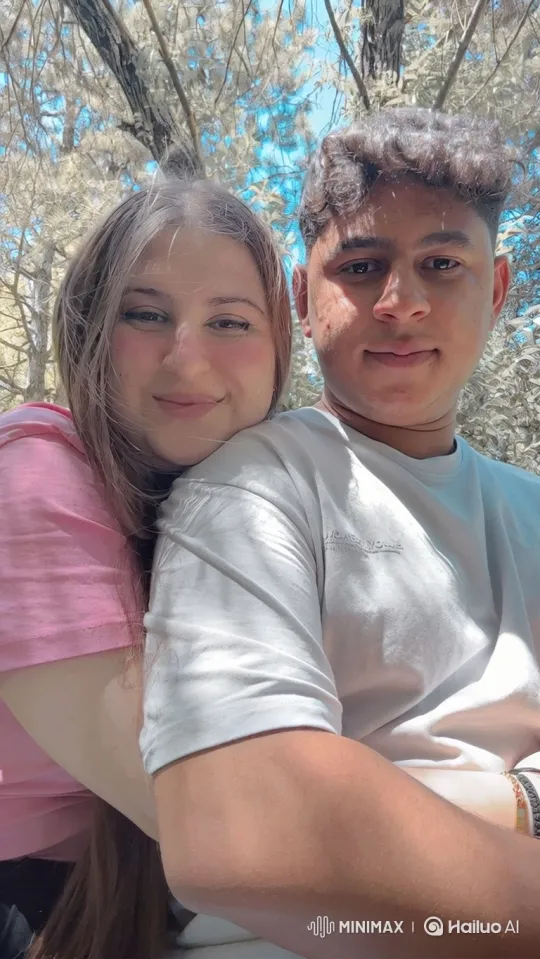 Family Embrace: Couple and Children's Joyful Reunion – AI Generated Video | Hailuo AI