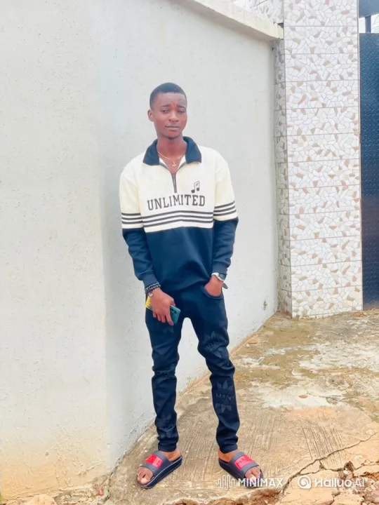 Young Man Poses in Stylish Attire, Evokes Calm Confidence – AI Generated Video | Hailuo AI