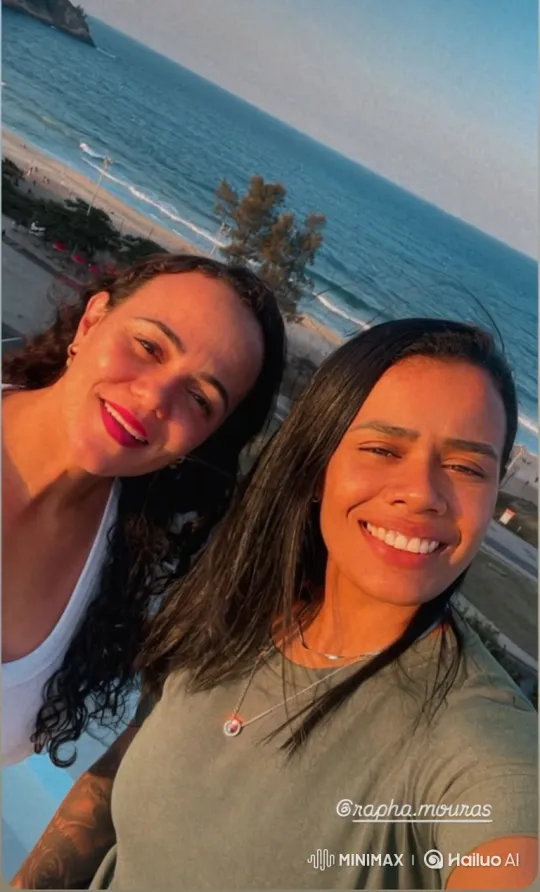 Two Women Share an Intimate Kiss on a Beach Balcony – AI Generated Video | Hailuo AI