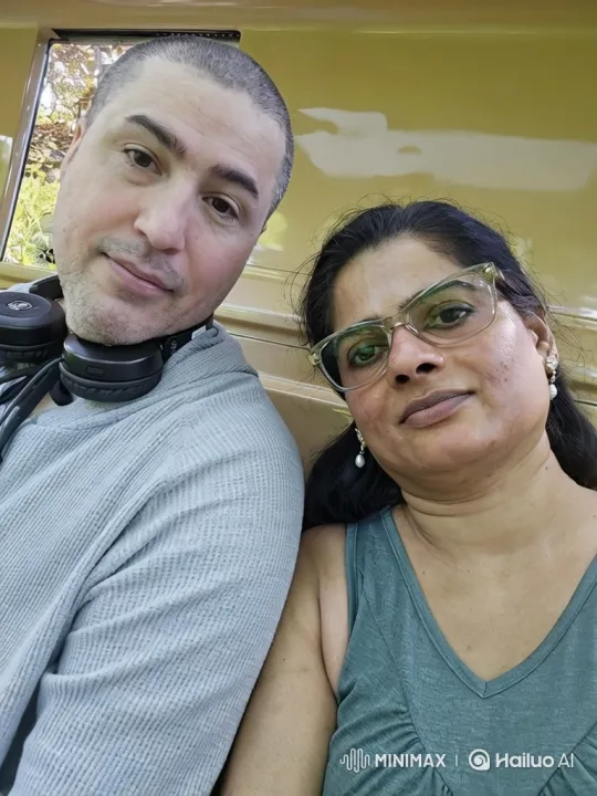 Couple on a Train Bench with Sunlit Scenery – AI Generated Video | Hailuo AI