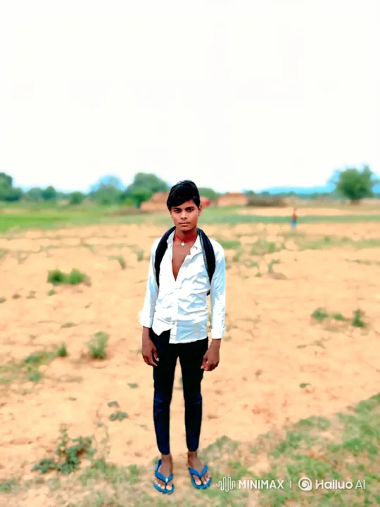 Young Man Approaches Camera in Open Field – AI Generated Video | Hailuo AI