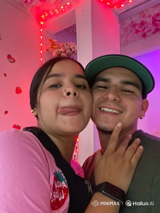 Young Family Embraces in Warmly Lit Room – AI Generated Video | Hailuo AI