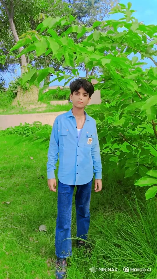 Young Boy in Park with Gentle Smile – AI Generated Video | Hailuo AI