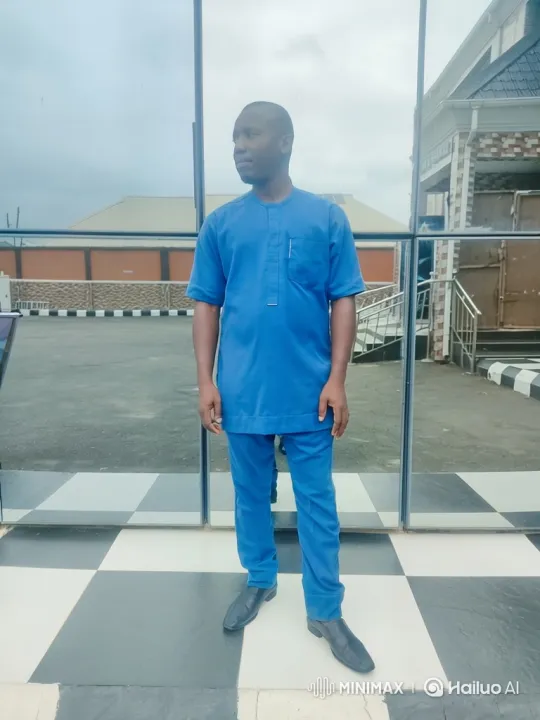 Man in Traditional Blue Outfit, Complex Camera Movement – AI Generated Video | Hailuo AI