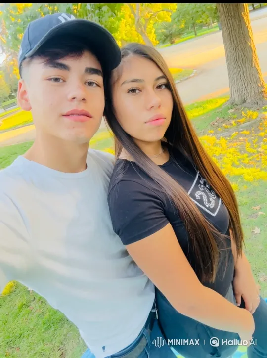 Family Embrace in Golden Hour Park Setting – AI Generated Video | Hailuo AI