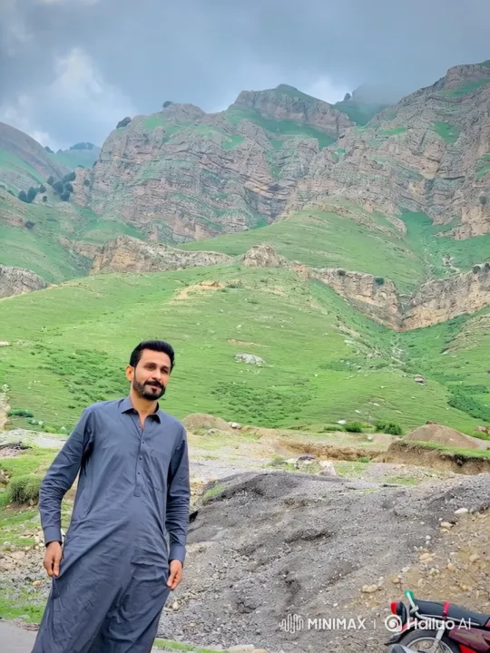 Man Contemplates Mountains in Slow-Zoom Video – AI Generated Video | Hailuo AI