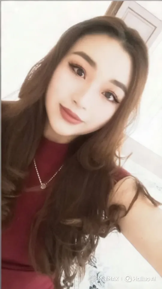 Woman in Burgundy Top with Inviting Atmosphere – AI Generated Video | Hailuo AI