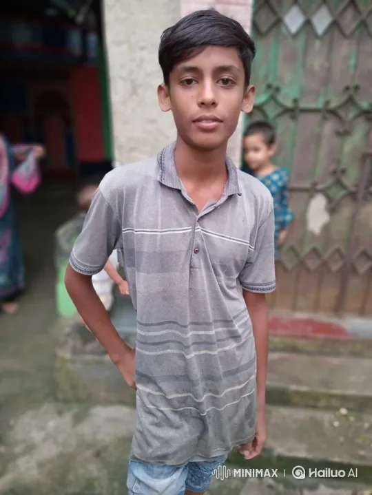 Young Boy Stands Calmly, Holding Gaze at Camera – AI Generated Video | Hailuo AI