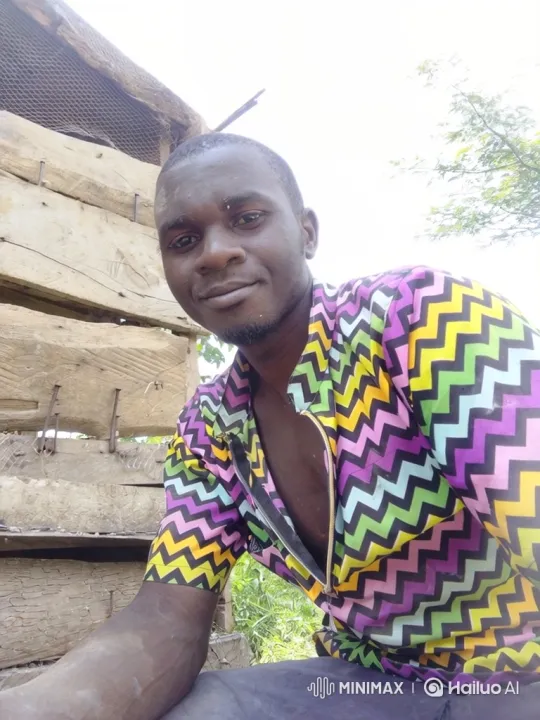 Young Black Man Smiles Warmly at Camera – AI Generated Video | Hailuo AI