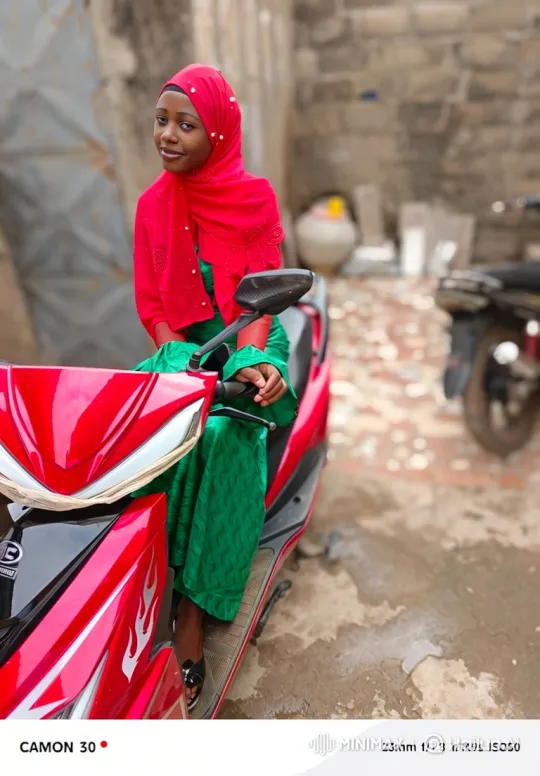 Young Woman Poses Proudly on Her Scooter – AI Generated Video | Hailuo AI